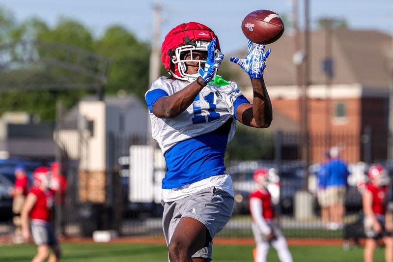 Louisiana Tech wide receiver De'Coldest Crawford, a Green Oaks graduate, catches a pass Tuesday during the Bulldogs' practice at Bossier City's Freedom Fields.