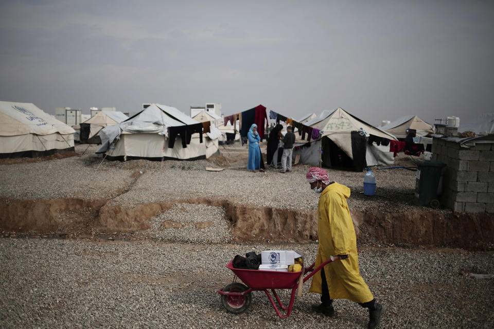 Aid worker with supplies in Mosul