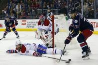 Nov 4, 2016; Columbus, OH, USA; Montreal Canadiens defenseman Greg Pateryn (8) knocks the puck off the stick of Columbus Blue Jackets left wing Nick Foligno (71) during the second period at Nationwide Arena. Mandatory Credit: Russell LaBounty-USA TODAY Sports