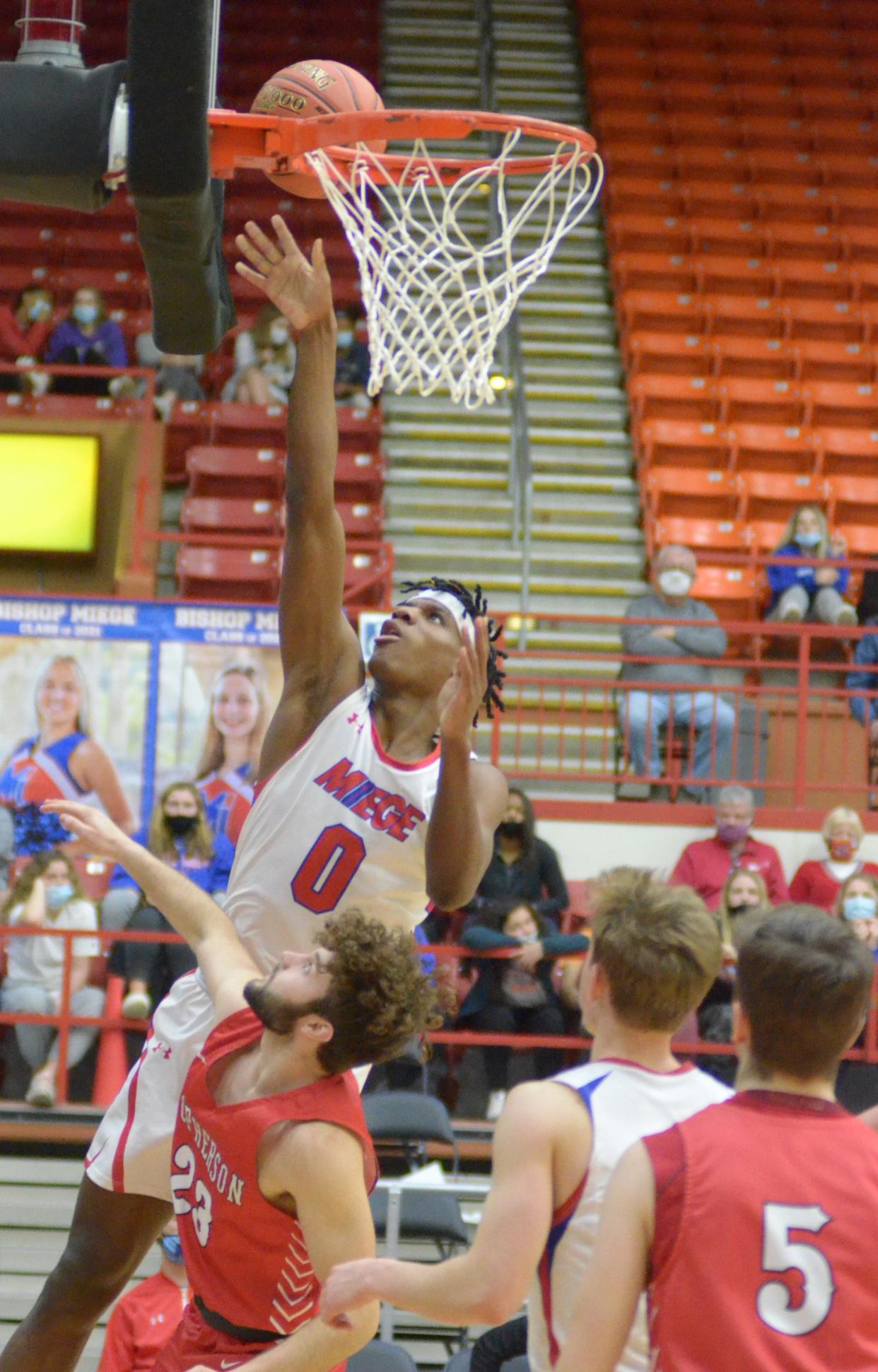 Taj Manning (0), who helped Bishop Miege to a Class 4A state championship last year in Salina, signed a basketball letter of intent with Kansas State on Wednesday. Manning is playing his senior season at La Lumiere High School in La Porte, Indiana.