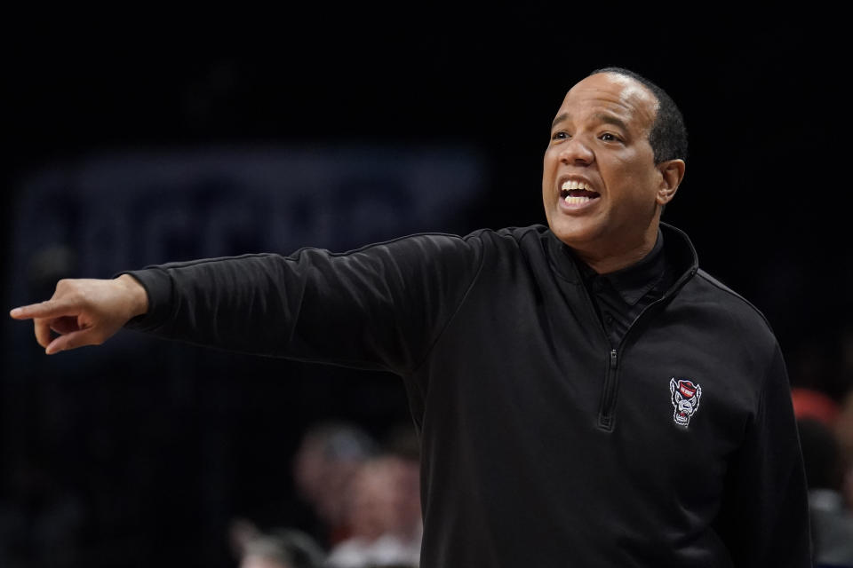 North Carolina State head coach Kevin Keatts works the bench during the first half of an NCAA college basketball game against Clemson during the Atlantic Coast Conference men's tournament, Tuesday, March 8, 2022, in New York. (AP Photo/John Minchillo)