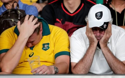 Australian supporters react following the Rugby World Cup Pool D game at Tokyo Stadium between Australia and Wales - Credit: AP