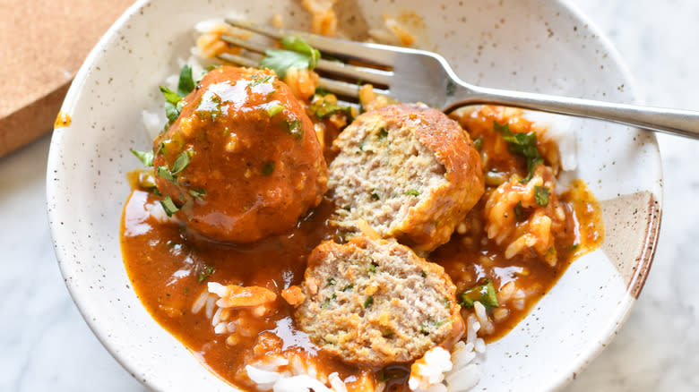 turkey meatballs with curry sauce and rice in bowl