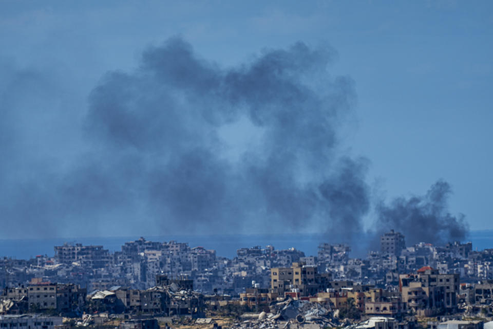 Smoke rises in the northern Gaza Strip, as seen from southern Israel, Sunday, March 10, 2024. (AP Photo/Ariel Schalit)