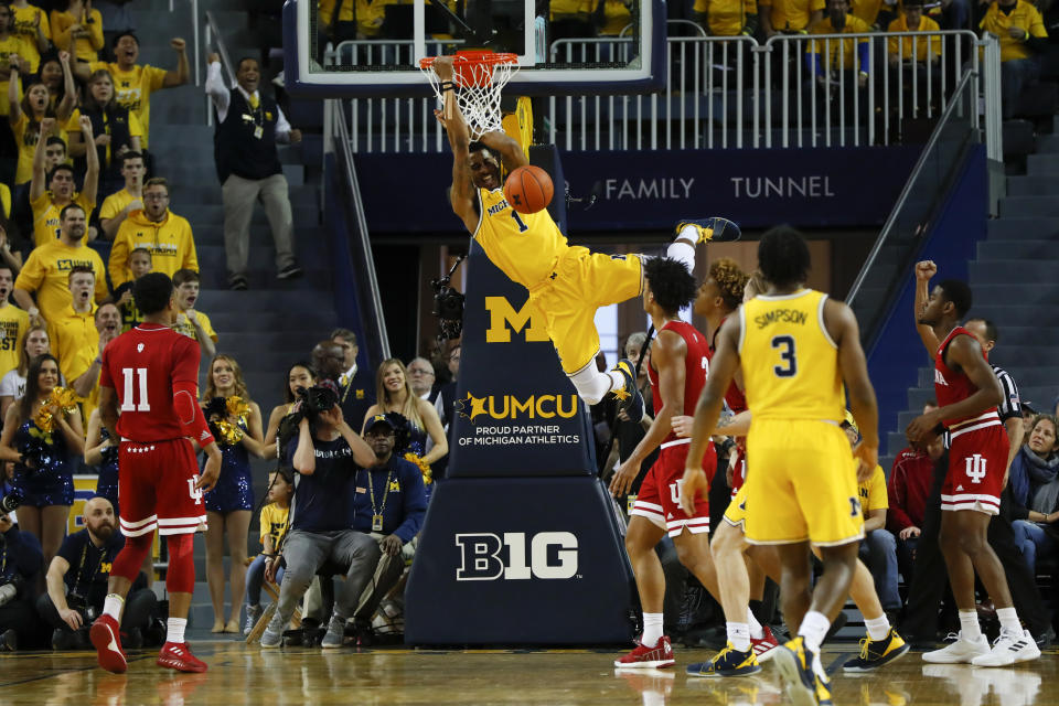 Michigan guard Charles Matthews (1) dunks in the first half of an NCAA college basketball game against Indiana in Ann Arbor, Mich., Sunday, Jan. 6, 2019. (AP Photo/Paul Sancya)