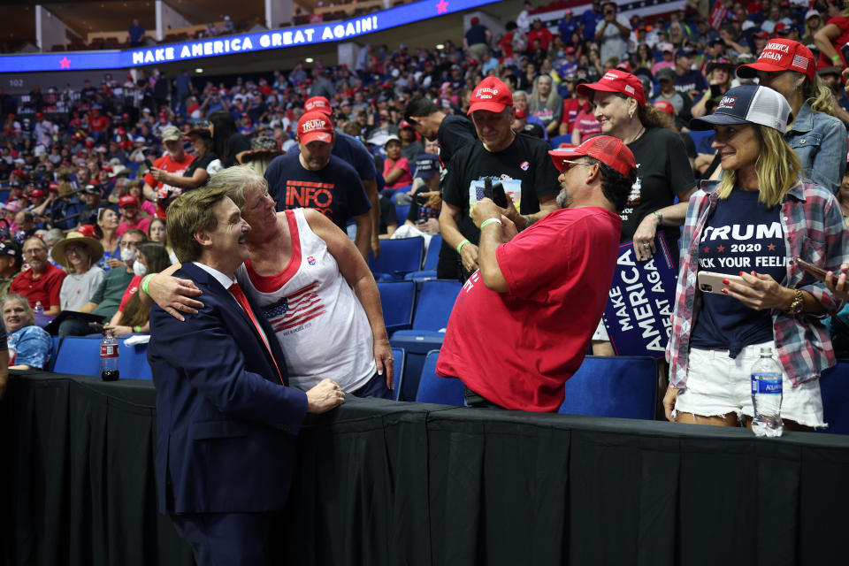 TULSA, OKLAHOMA - JUNE 20: MyPillow founder Michael J. Lindell (L) greets people before the start of a campaign rally for U.S. President Donald Trump at the BOK Center, June 20, 2020 in Tulsa, Oklahoma. Trump is holding his first political rally since the start of the coronavirus pandemic at the BOK Center on Saturday while infection rates in the state of Oklahoma continue to rise. (Photo by Win McNamee/Getty Images)