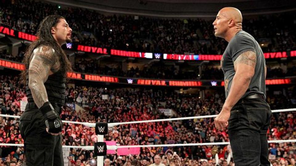 The Rock (right) and his ‘cousin’ Roman Reigns in 2015; they will team in the Night 1 main event at WrestleMania 40 (WWE)