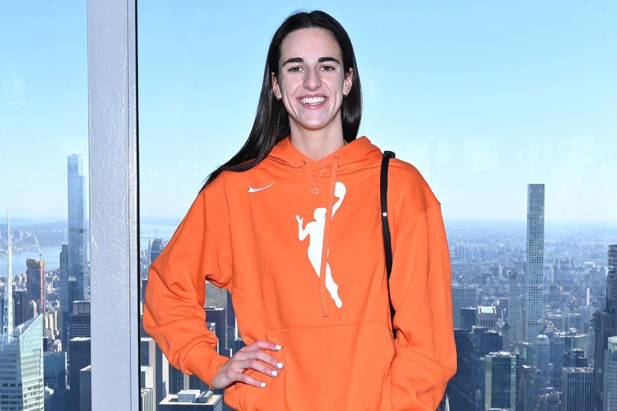 <p>Roy Rochlin/Getty </p> Caitlin Clark at The Empire State Building on April 15, 2024 in New York City.