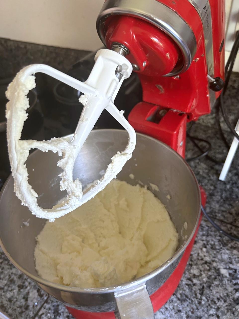 Adding the flour for Ina Garten's chocolate cake with mocha frosting