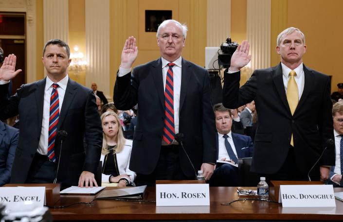 Former assistant Attorney General for the Office of Legal Counsel Steven Engel, former Acting Attorney General Jeffrey A. Rosen, and former acting Deputy Attorney General Richard Donoghue are sworn in before testifying Thursday. (Photo by Jonathan Ernst/Pool/AFP via Getty Images)