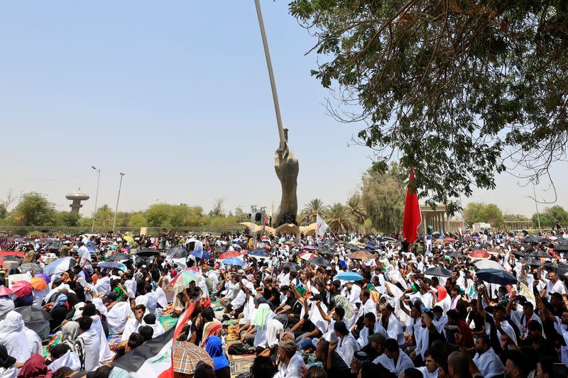 Supporters of Iraqi populist leader Moqtada al-Sadr gather for mass Friday prayer, in Baghdad