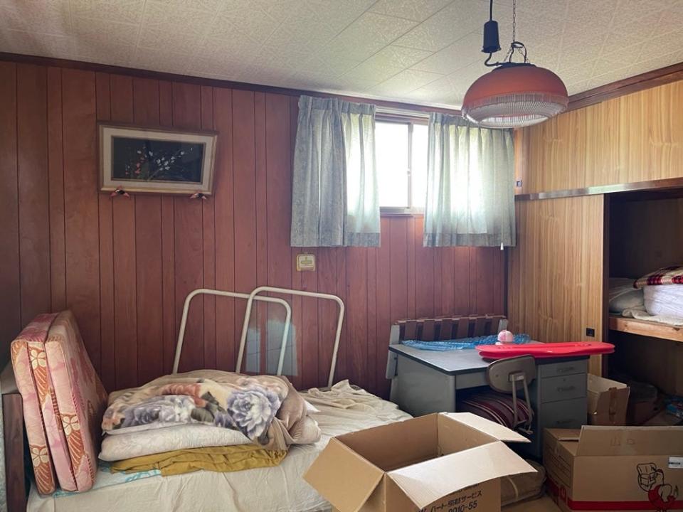 A room in the akiya filled with belongings from the previous owner.