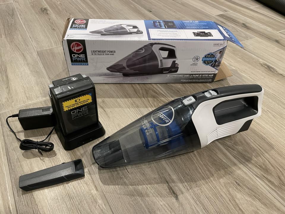 ONEPWR Cordless Hand Held Vacuum Cleaner with its attachments on our floor