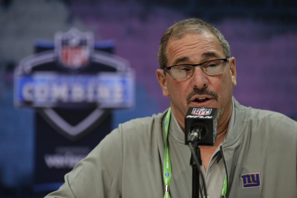 FILE - In this Feb. 25, 2020, file photo, New York Giants senior vice president and general manager Dave Gettleman speaks during a press conference at the NFL football scouting combine in Indianapolis. Gettleman made three draft-day deals in which he moved up and down, found promising players at need positions and picked up three extra choices for next year's event that supposed to deeper in talent (AP Photo/Michael Conroy, File)