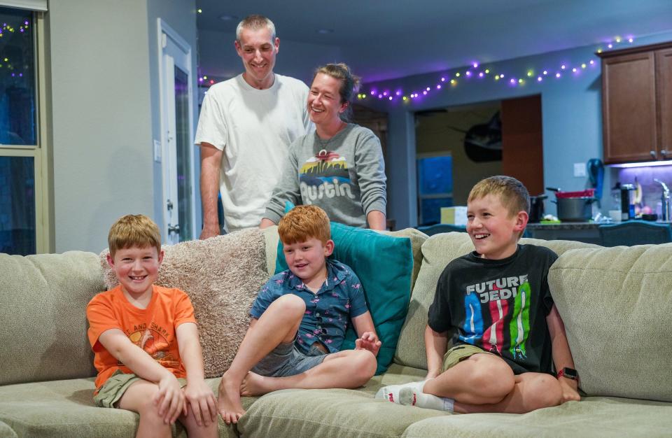 Al and Cristi Peterson enjoy time at home with their children, from left, Charlie, Louis and Hartman. Cristi Peterson was careful what she told the boys after Al's motorcycle accident.
