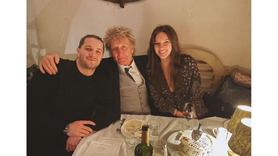 Liam Stewart with Rod Stewart and Renee Stewart at a table