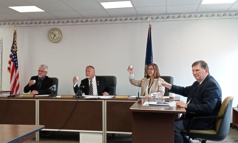 MILK TOAST: Helping to make a "milk toast" for Wayne County Dairy and Ice Cream Months, from left are county commissioners James Shook, Brian Smith and Jocelyn Cramer, and solicitor Wendell Kay.