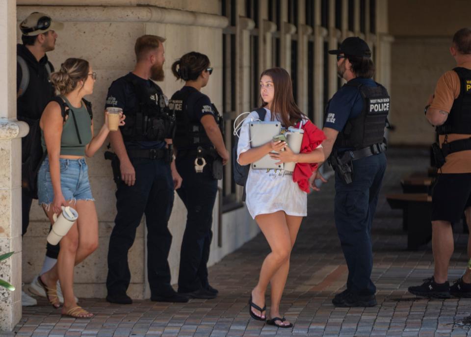 Police secure the area outside the Warren Library after a false report of an active shooter on campus at Palm Beach Atlantic University in West Palm Beach, Florida on May 2, 2023.