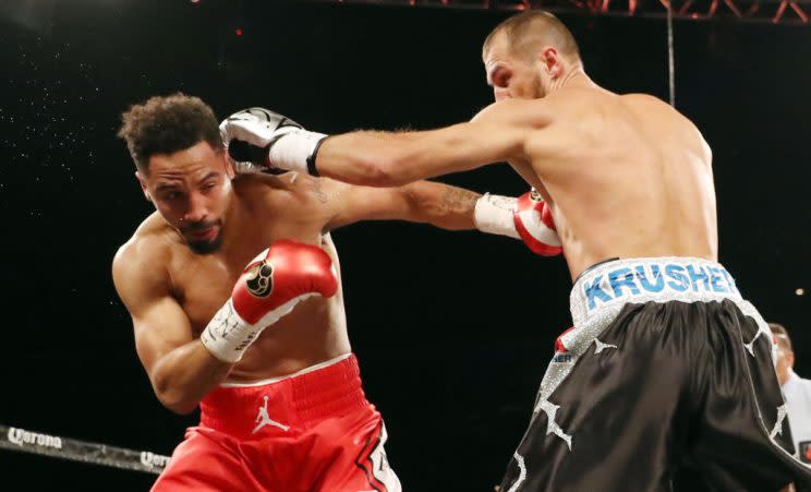 Andre Ward (L) and Sergey Kovalev trade blows during their rematch on Saturday. (Getty)