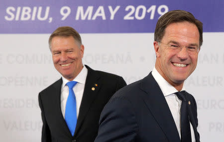 Dutch Prime Minister Mark Rutte is welcomed by Romanian President Klaus Iohannis as he arrives for the informal meeting of European Union leaders in Sibiu, Romania, May 9, 2019. REUTERS/Stoyan Nenov