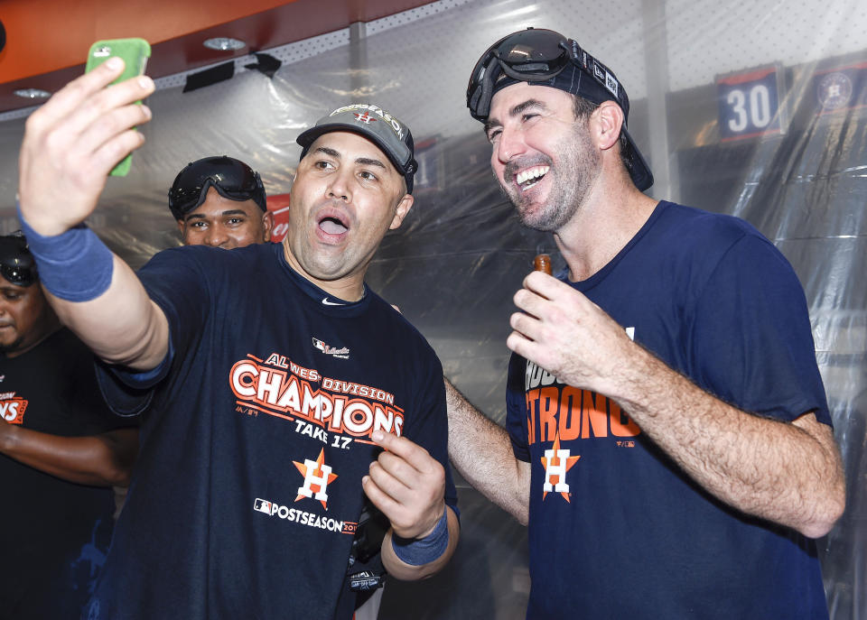 Carlos Beltran celebrates the Astros' World Series win with Justin Verlander. (AP)