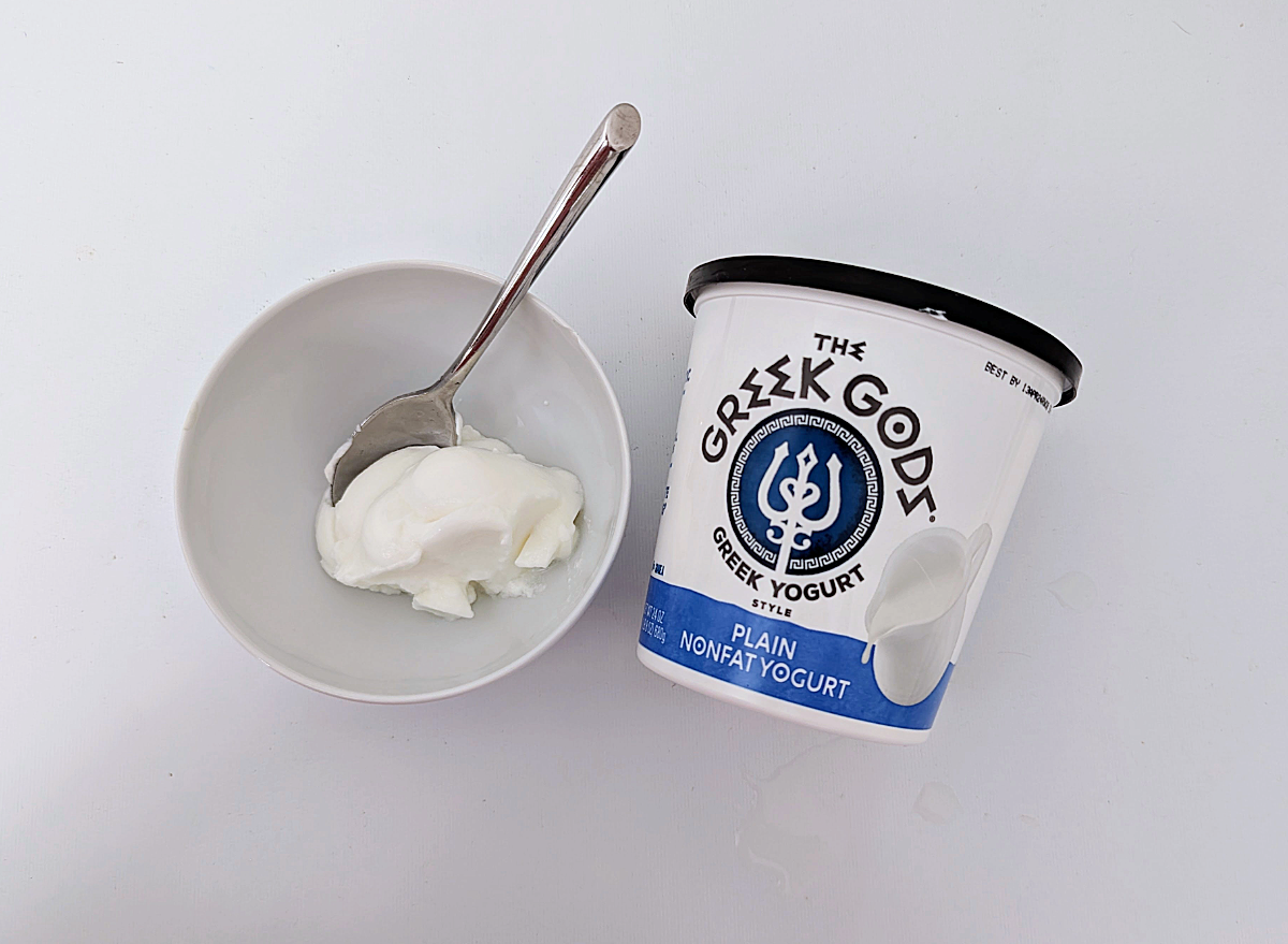 greek yogurt in container and a bowl.