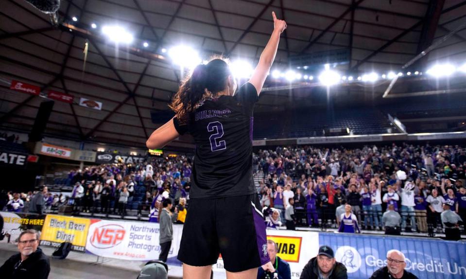 Garfield’s Katie Fiso celebrates following the Bulldogs’ 3A girls state title win over the Lake Washington Kangaroos at the WIAA state basketball tournament in the Tacoma Dome in Tacoma, Washington, on Saturday, March 4, 2023. Garfield won the game, 58-49.