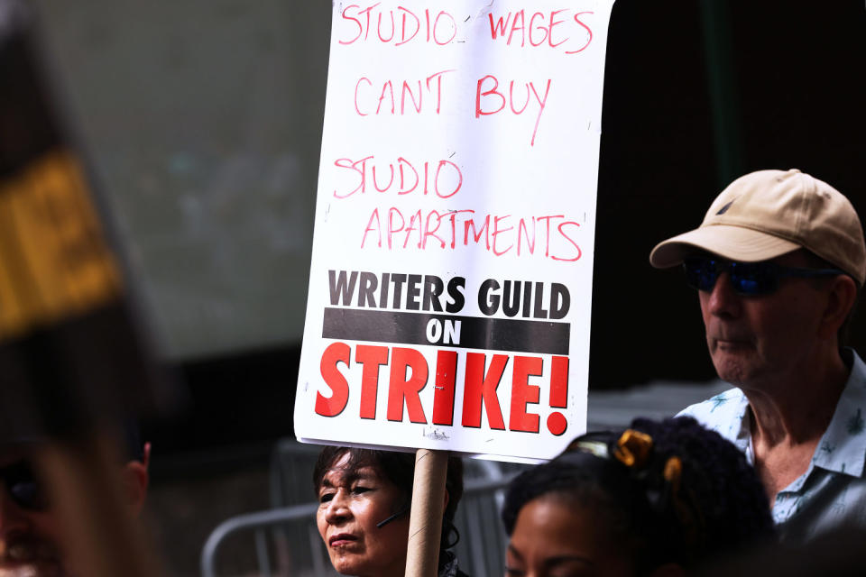 Striking WGA members picket in New York (Michael M. Santiago / Getty Images)