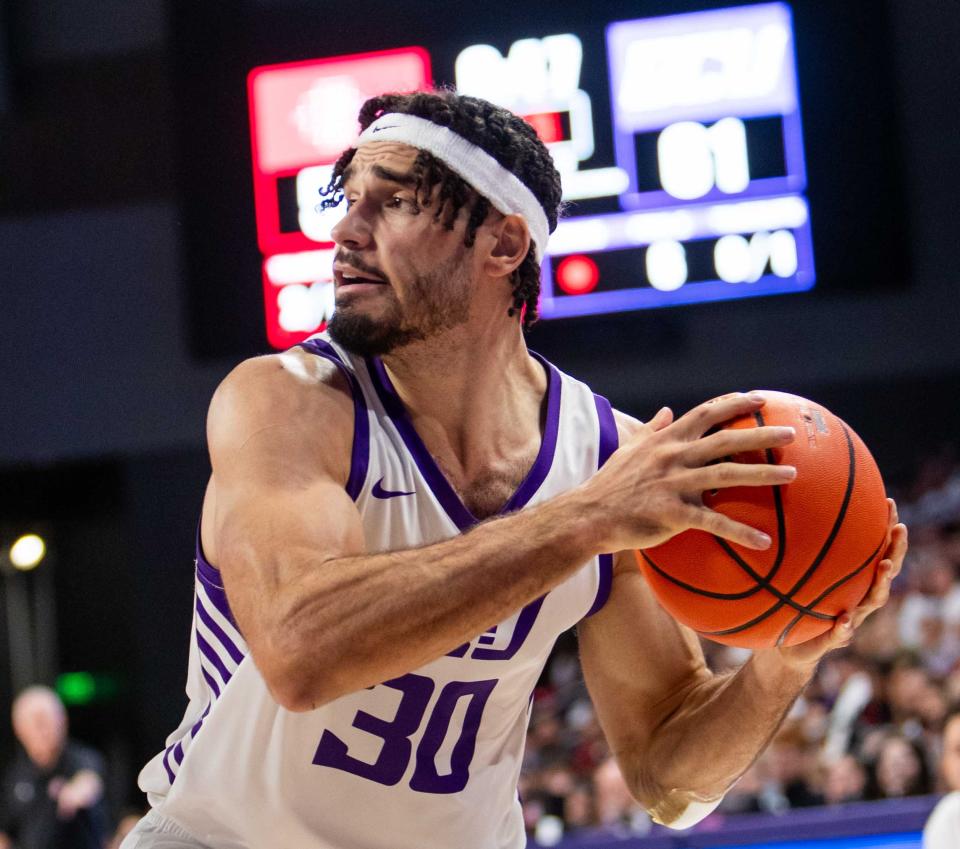 Grand Canyon forward Gabe McGlothan (30) prepares to pass the ball during the game against the San Diego State Aztecs at GCU Arena in Phoenix on Dec. 5, 2023.