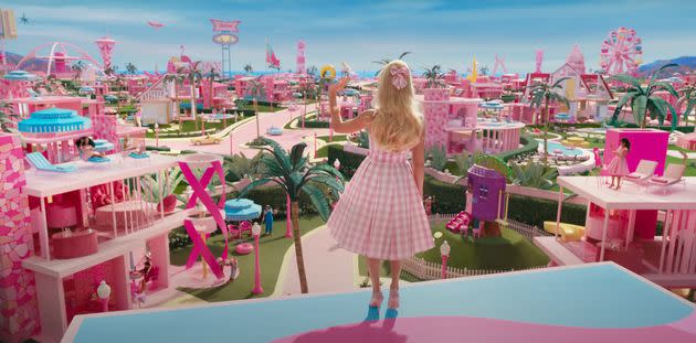 Barbie looks out onto Barbieland in the trailer for the new film