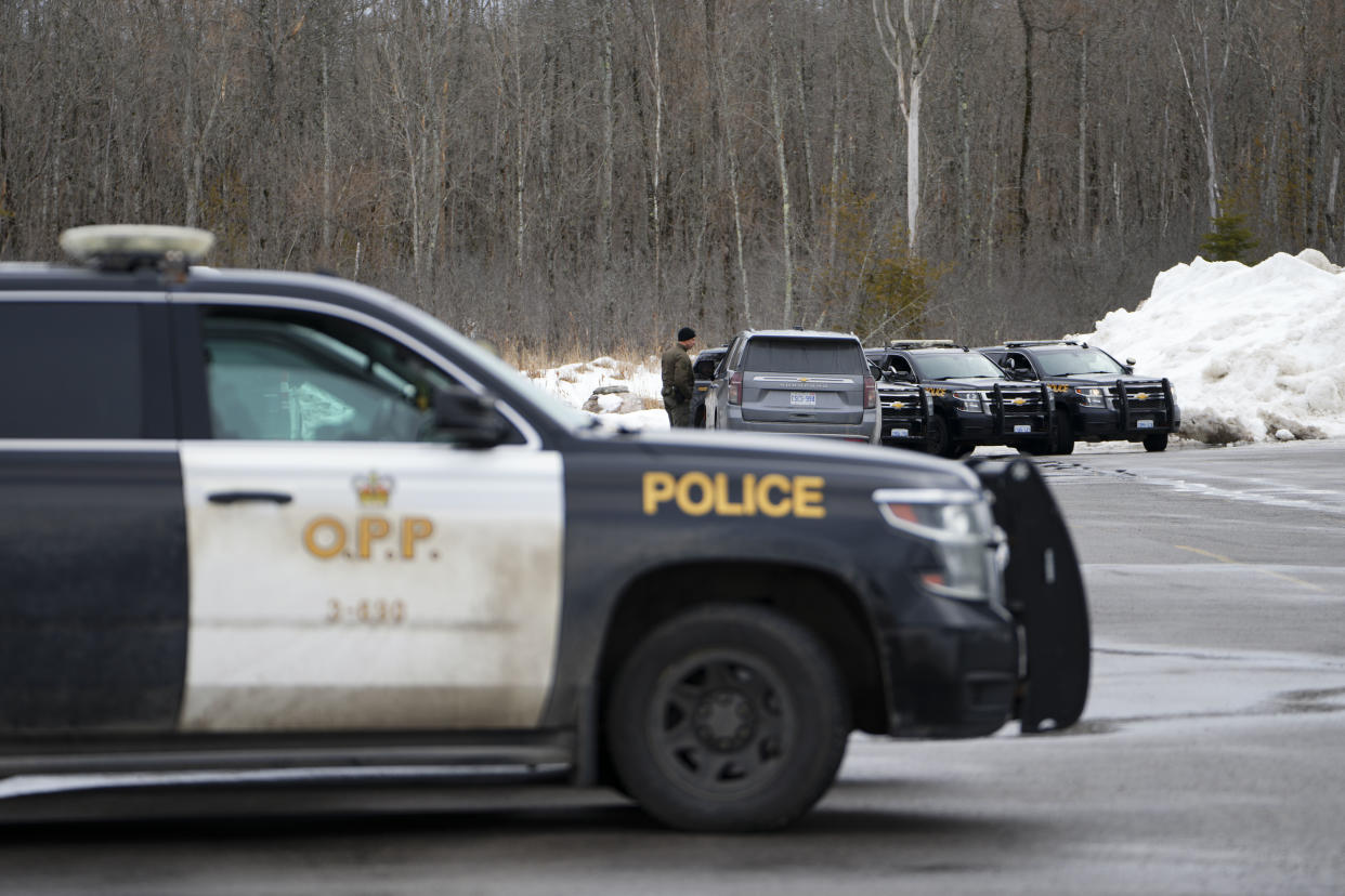 Ontario Provincial Police park at Beckwith Park, Ontario. talking to a driver