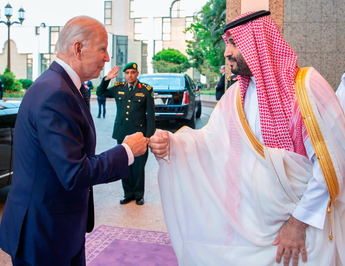 In this photo released by Saudi Press Agency (SPA), Saudi Crown Prince Mohammed bin Salman, right, greets President Joe Biden, with a fist bump after his arrival in Jeddah, Saudi Arabia, Friday, July 15, 2022.