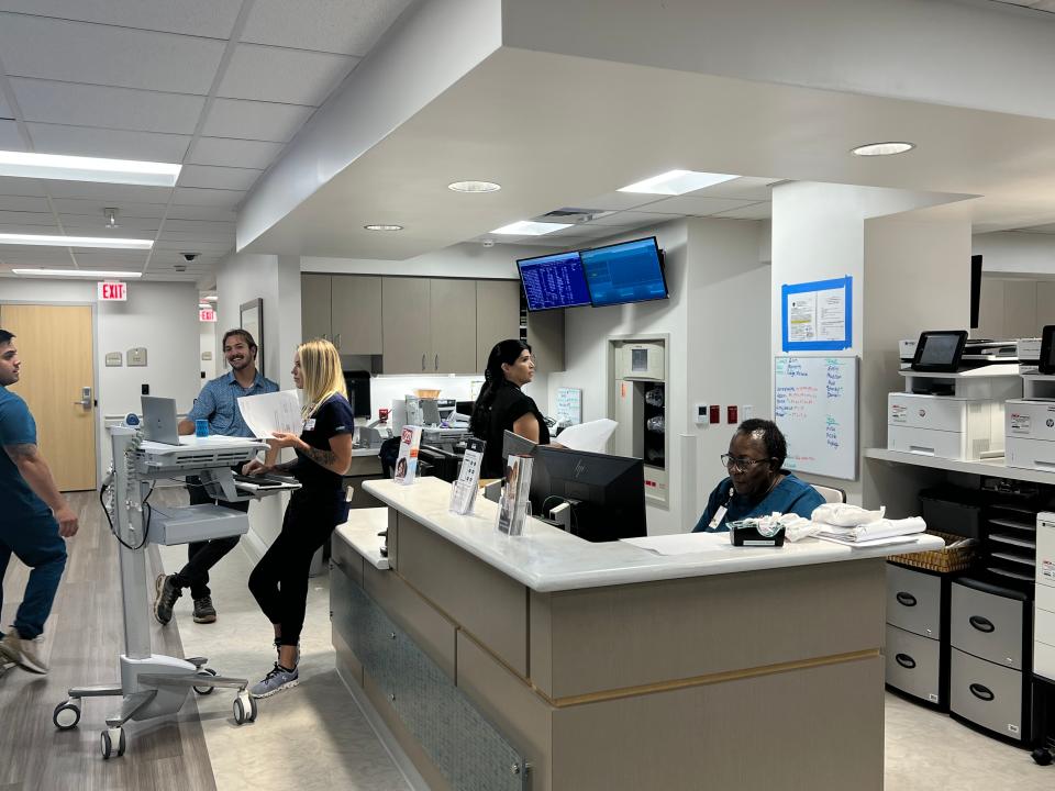 Nurses talk at the new front desk inside HCA Palms West children's emergency room. The facility unveiled the $8.5 million expansion on Wednesday, Sept. 20, 2023.