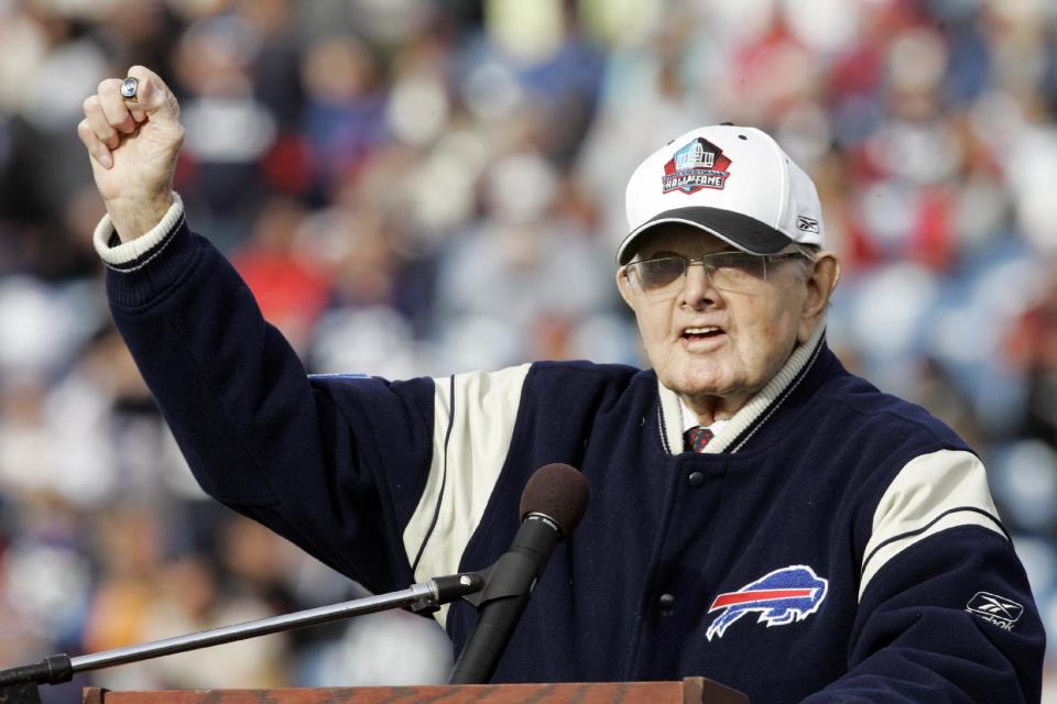 FILE - In this Nov. 1, 2009, file photo, Buffalo Bills' owner Ralph Wilson Jr. holds up his Hall of Fame ring during a halftime NFL football ceremony against the Houston Texans in Orchard Park, N.Y. Bills owner Wilson Jr. has died at the age of 95. NFL.com says team president Russ Brandon announced his death at the league's annual meeting. (AP Photo/Dean Duprey, File)