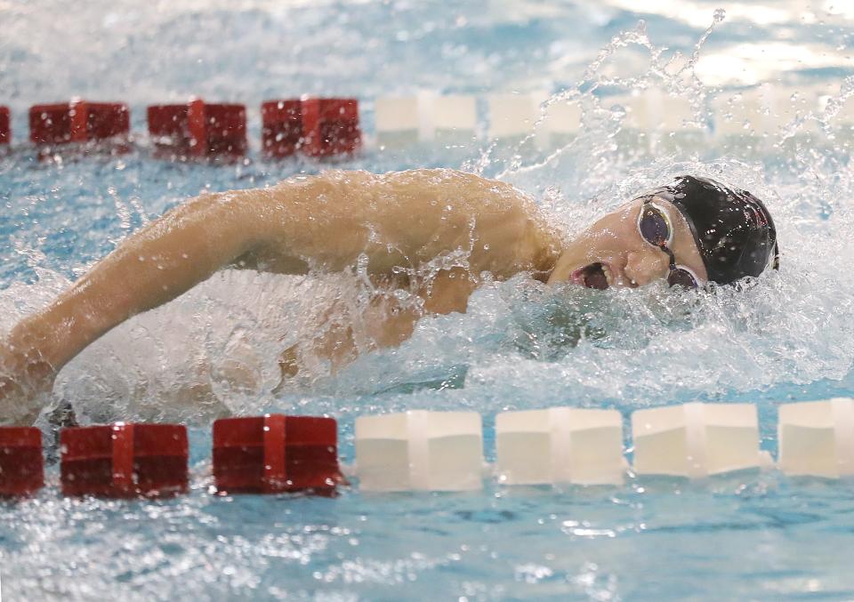 Stows Alex Cimera competes in the 100 yard freestyle event at the Northeast Classic swim meet on Saturday, Jan. 15, 2022 in Canton, Ohio, at Branin Natatorium.