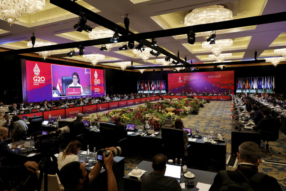 Indonesia's Foreign Minister Retno Marsudi is seen on the screen during the G20 Foreign Ministers' Meeting in Nusa Dua, Bali, Indonesia Friday, July 8, 2022. (Willy Kurniawan/Pool Photo via AP)