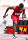 <b>Track: Men's 4x400 relay</b><br>American Manteo Mitchell runs in the heats of the men's 4x400m relays at the London Games. Mitchell actually broke his leg midway through his run but finished the relay to help the U.S. qualify for the finals. However, the U.S. came second in the final race to Bahamas, ending a gold streak they'd held since the 1972 Games. (Photo by Ian MacNicol/Getty Images)