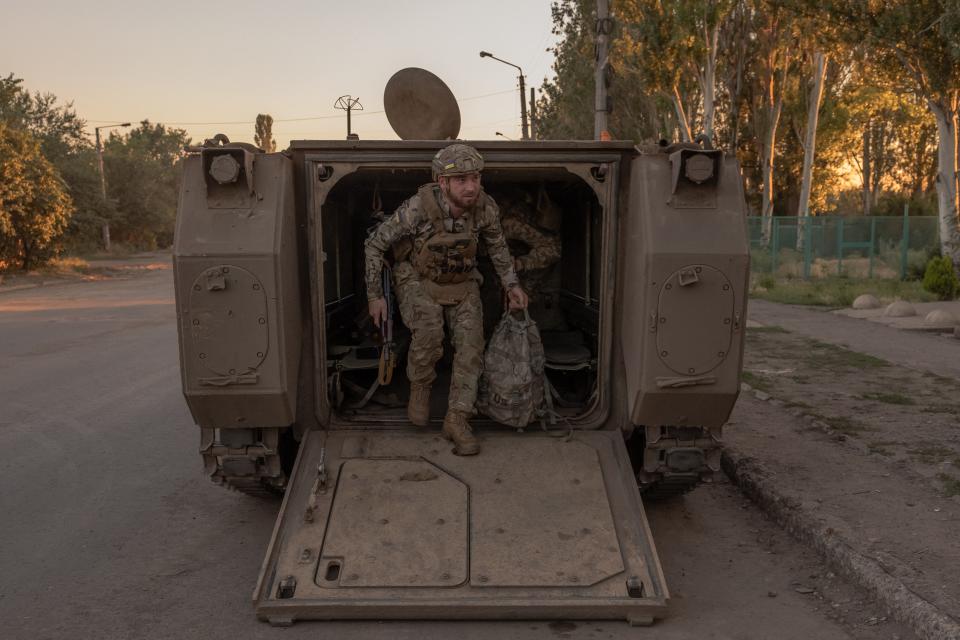 A Ukrainian soldier disembarks from a US-made M113 armoured personnel carrier in an undisclosed area in the Donetsk region (AFP via Getty Images)