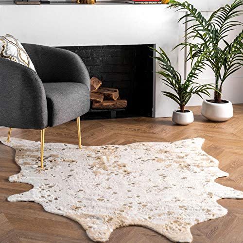 7) Faux Cow Printed Abstract Rug