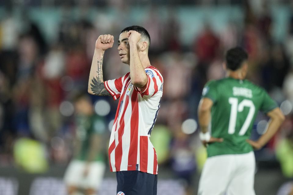 Paraguay's Miguel Almidón celebrats after his team´s 1-0 victory over Bolivia after a qualifying soccer match for the FIFA World Cup 2026, at Defensores del Chaco Stadium in Asuncion, Paraguay, Tuesday, Oct. 17, 2023. (AP Photo/Jorge Saenz)