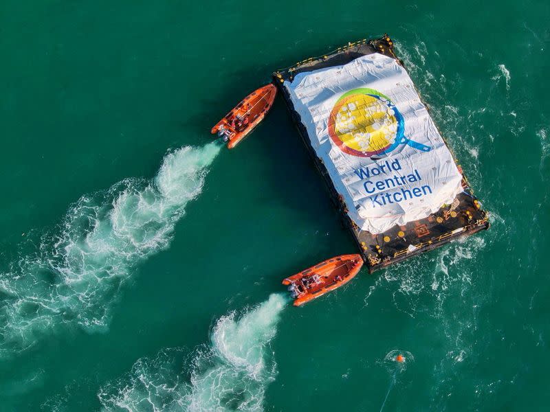 FILE PHOTO: Aid supply ship from Cyprus reaches Gaza coast but weather slows delivery