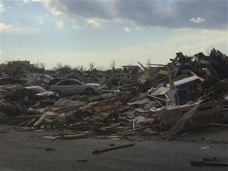 Extensive damage to homes is pictured in the aftermath of a tornado that touched down in Washington, Illinois