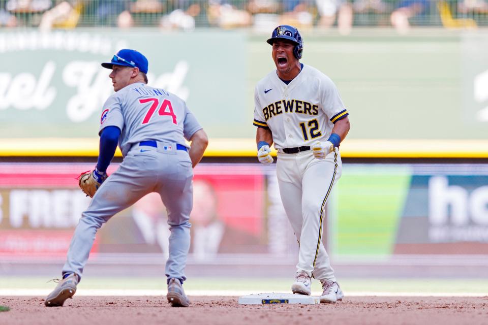 Brewers pinch-hitter Jahmai Jones reacts at second base after hitting a 3-run double during the seventh inning against the Chicago Cubs.