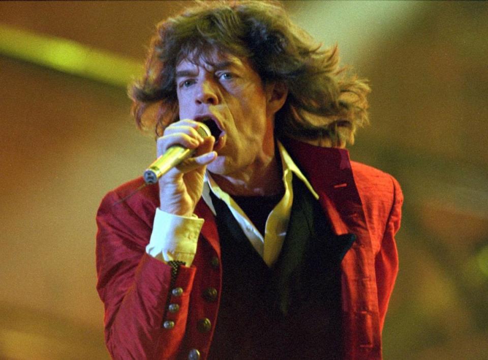 Mick Jagger sings “Tumblin’ Dice,” the second song of the Rolling Stones’ Voodoo Lounge Tour concert date at Joe Robbie Stadium on Nov. 25, 1994.