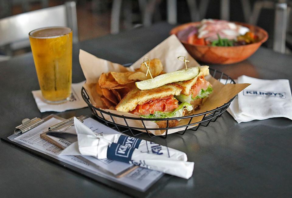 A beer and a sandwich at Kilroy's on the Square at 24 Cottage Ave. in Quincy on Monday, July 17, 2023.