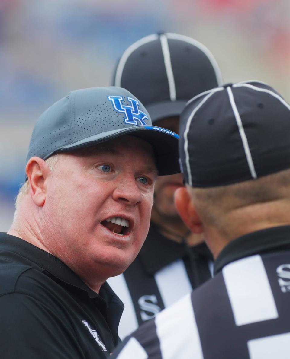 Kentucky’s Mark Stoops lets the refs know he is not happy with a call against Ball State on Sept. 2.