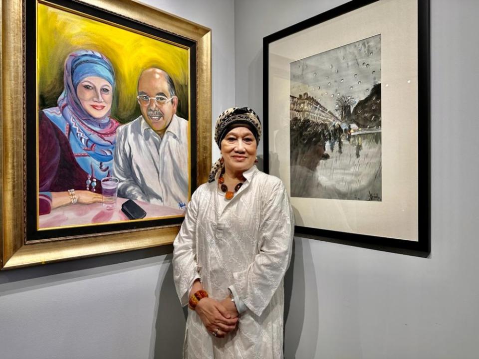Aziah with oil on canvas London ‘69 —- the year she got married at the Msian High Commission and Tunku Abdul Rahman did the sprinkling of the holy water ceremony. Pic courtesy of Nora Albar