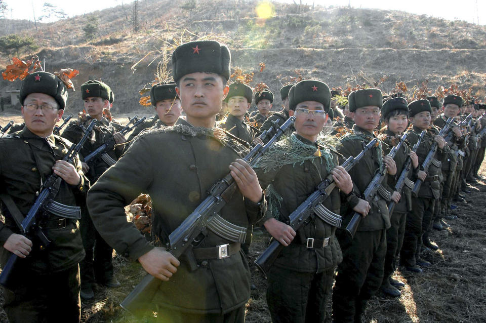 <p>North Korean members of the Worker-Peasant Red Guards attend military training in this picture released by the North’s official KCNA news agency in Pyongyang, North Korea, March 13, 2013. (KCNA/Reuters) </p>