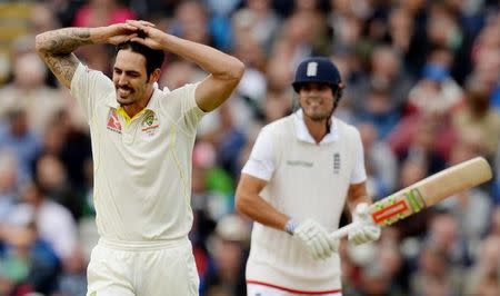 Cricket - England v Australia - Investec Ashes Test Series Third Test - Edgbaston - 29/7/15 Australia's Mitchell Johnson reacts watched by England's Alastair Cook Reuters / Philip Brown Livepic