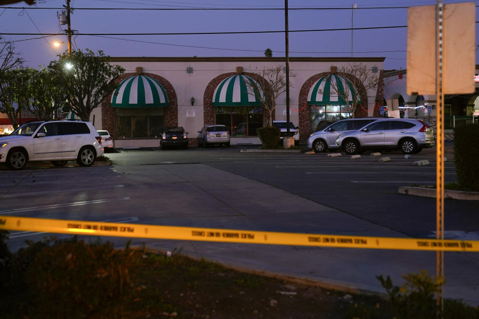 FILE - Police tape cordons off the Star Dance Studio, the site of a mass shooting, in Monterey Park, Calif., Sunday, Jan. 22, 2023. In the course of 48 hours, two gunmen went on shooting rampages at both ends of California that left 18 dead and 10 wounded.(AP Photo/Jae C. Hong, File)